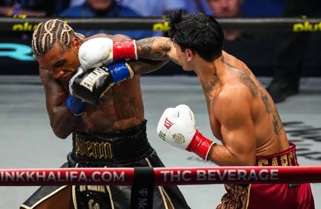 Ryan Garcia punches Conor Benn